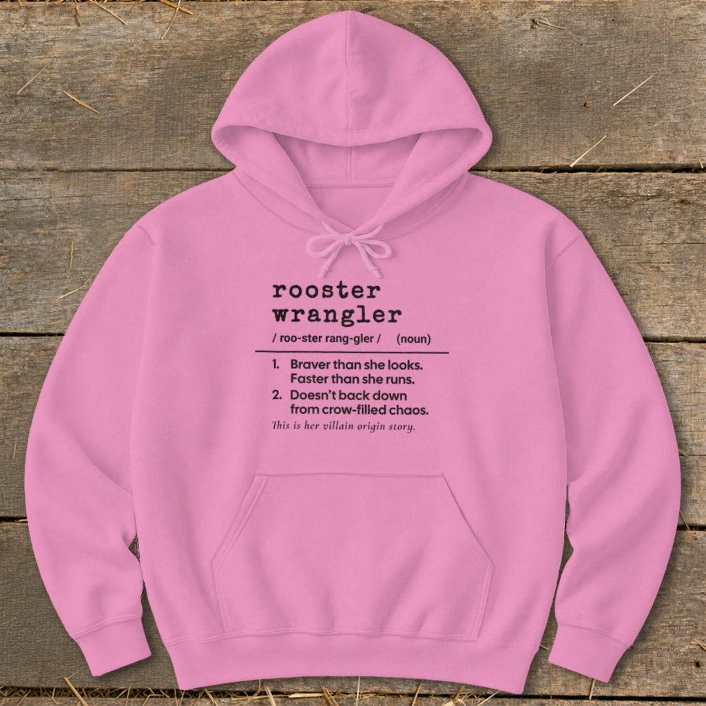Pink hoodie with "rooster wrangler" definition text.
