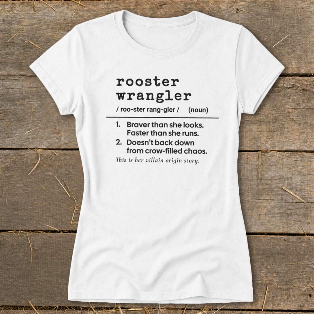 White t-shirt with black text defining "rooster wrangler" and its villain origin story.