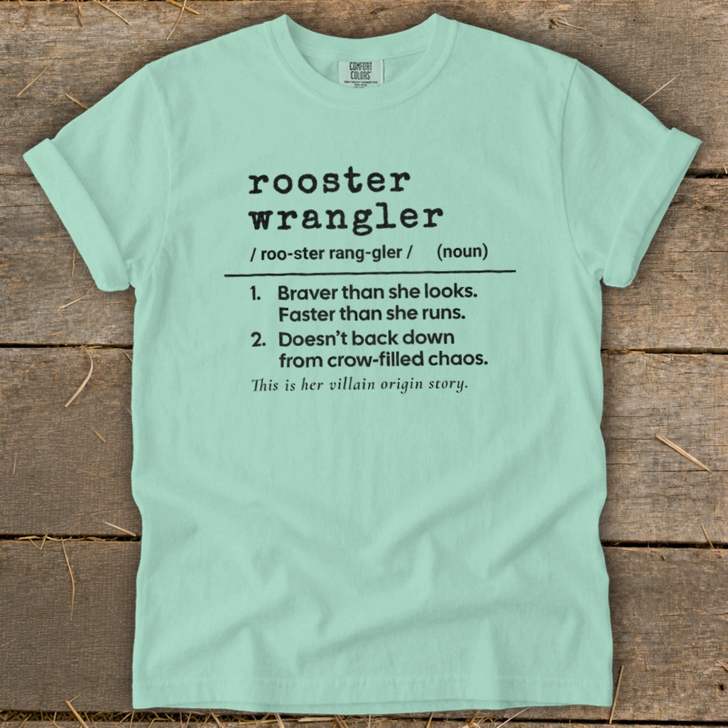 Mint green t-shirt with "rooster wrangler" definition including its origin story.