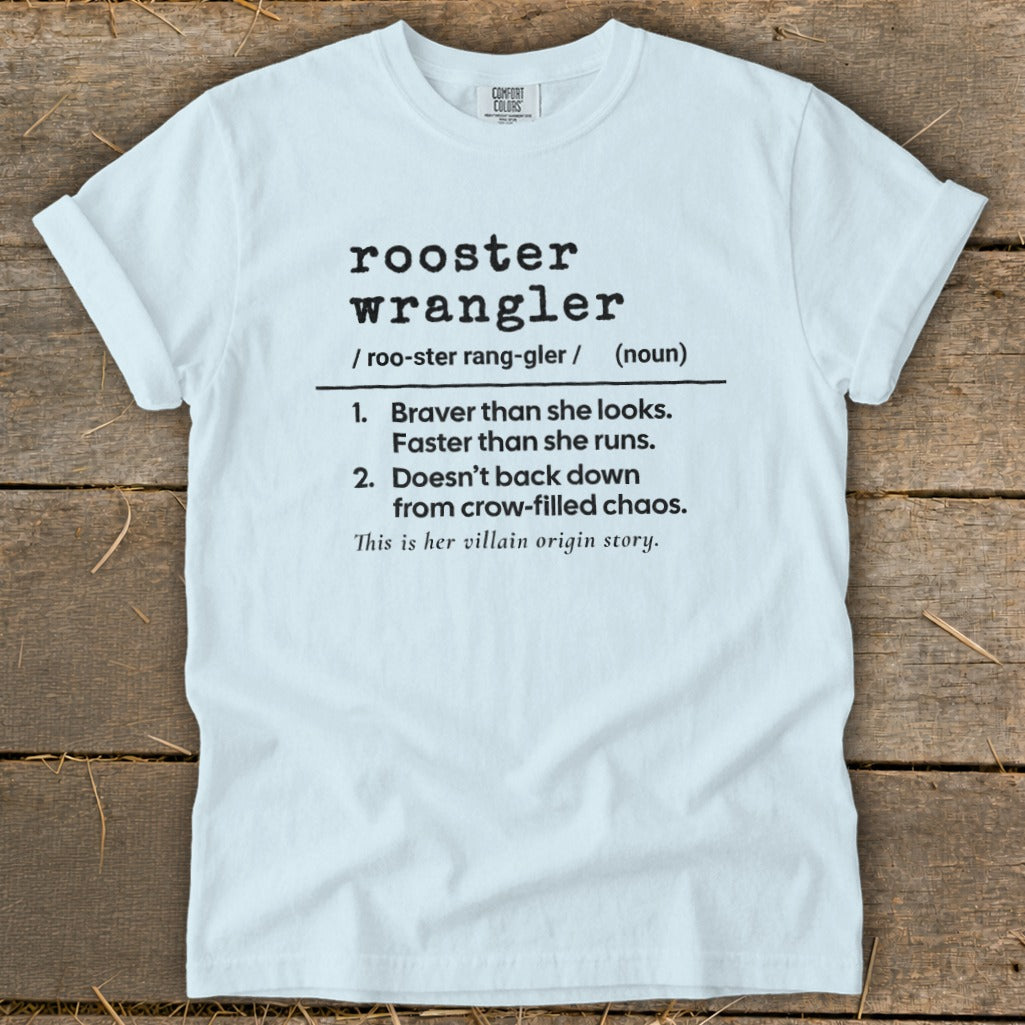 White t-shirt with black text defining "rooster wrangler" with two numbered descriptions.