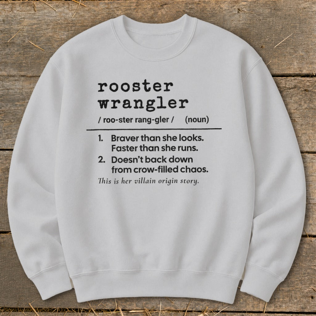 White sweatshirt with "rooster wrangler" definition including traits and villain origin story.