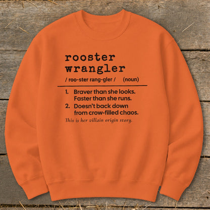 Orange sweatshirt with "rooster wrangler" definition and witty phrases.