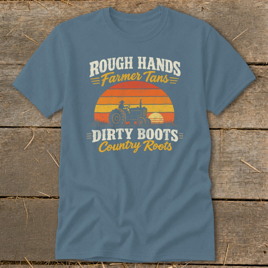 Steel blue crewneck t-shirt featuring distressed text reading Rough Hands Farmer Tans Dirty Boots Country Roots above a tractor graphic.