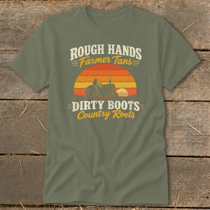 An olive green t-shirt with a vintage graphic of a tractor, sunset, and text.