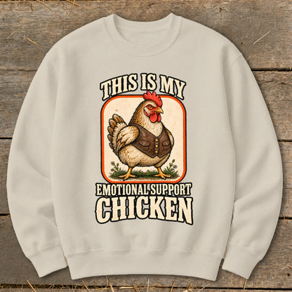 Crewneck sweatshirt with graphic of chicken in vest, text reads "This is my emotional support chicken."