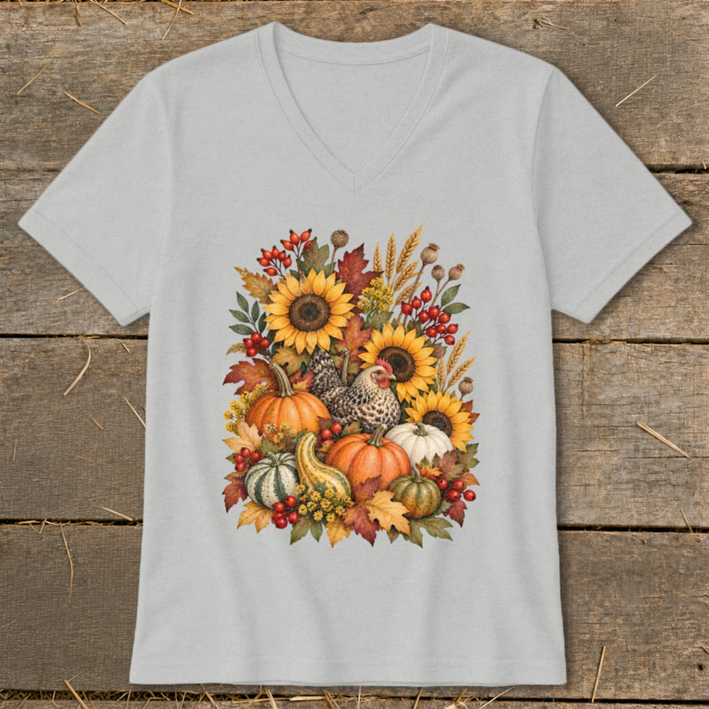 Light grey v-neck t-shirt with a watercolor fall harvest graphic featuring chickens and pumpkins.