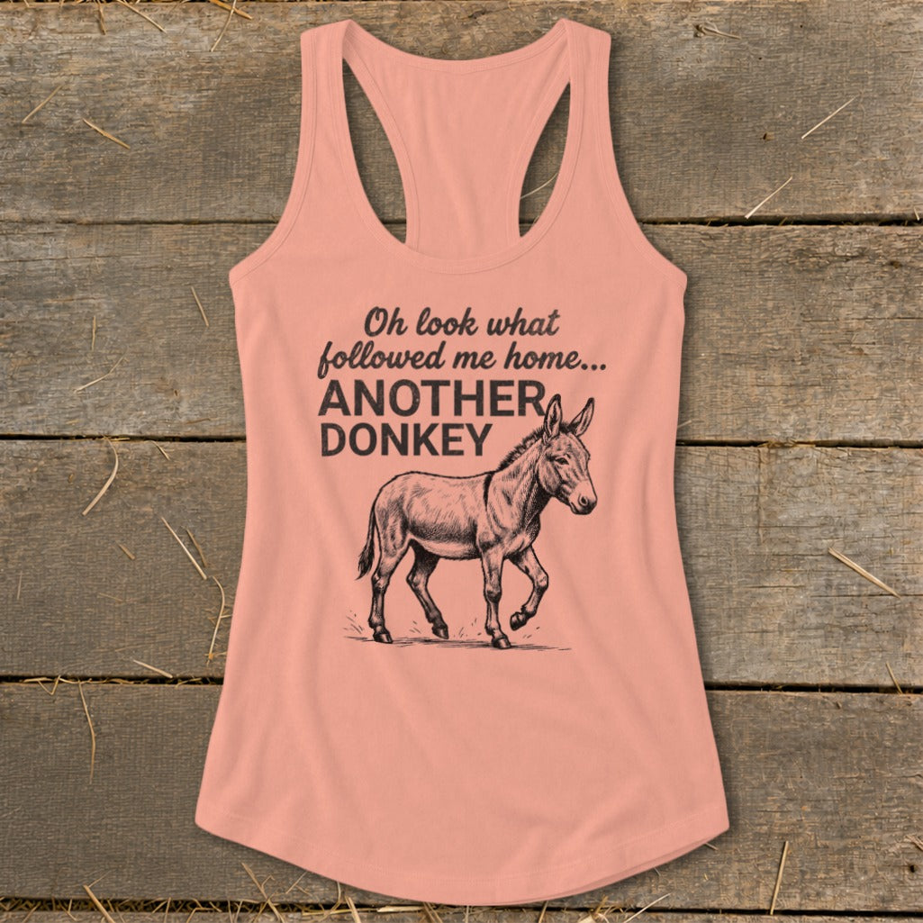 Peach tank top with text "Oh look what followed me home... ANOTHER DONKEY" and a donkey illustration.