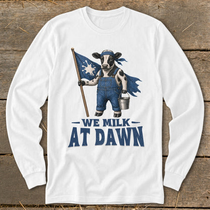 Cow wearing overalls and cape holds flag and milk bucket, text says "WE MILK AT DAWN".