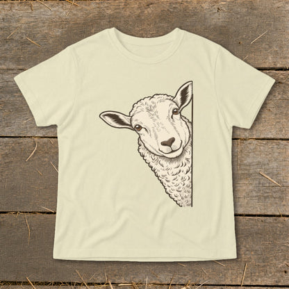 Cream t-shirt with a black outline illustration of a sheep peeking from the right.