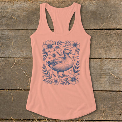 Peach tank top with a blue duck and floral illustration in the center.