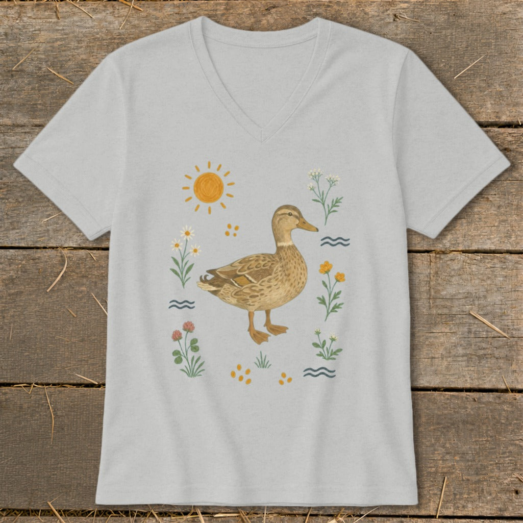 Light gray v-neck t-shirt with a cartoon duck surrounded by flowers, sun, and water.
