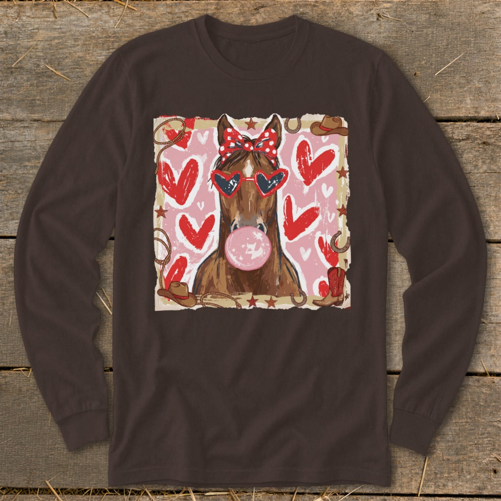 Horse with bandana, heart sunglasses, and bubblegum in front of pink hearts.