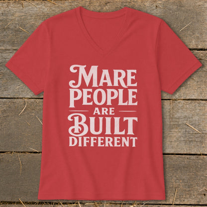 Red v-neck t-shirt with white text "Mare People Are Built Different".