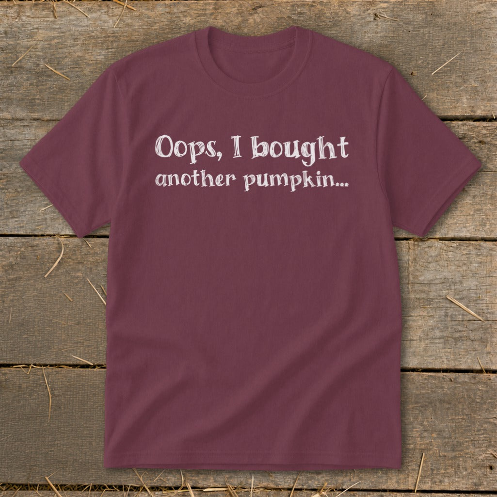 Maroon t-shirt with white text reading "Oops, I bought another pumpkin..."