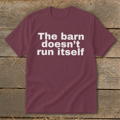 Maroon t-shirt with white text "The barn doesn't run itself".