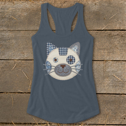 Blue racerback tank top with a stitched cat face applique in blue and white patterns.