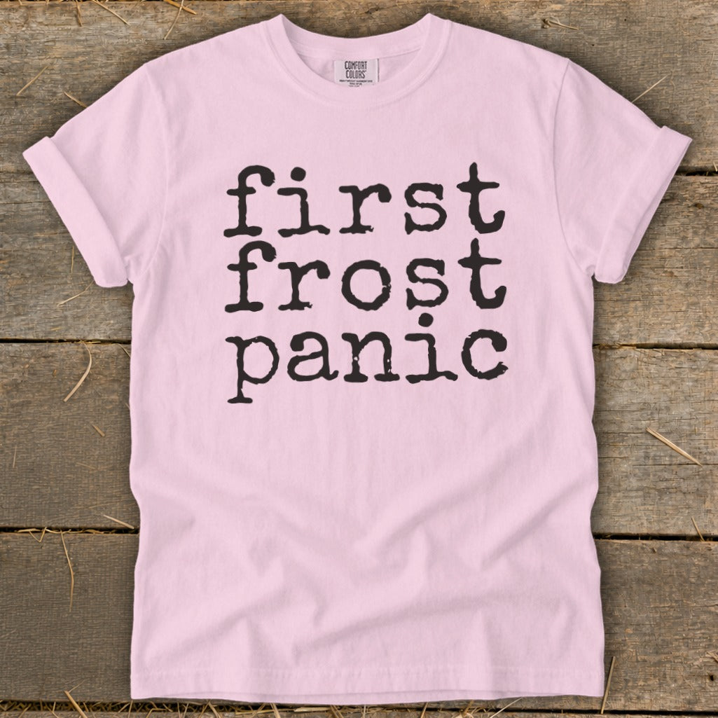 Pink t-shirt with "first frost panic" text in black typewriter font.