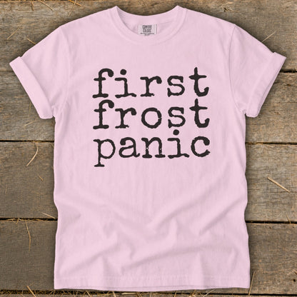 Pink t-shirt with "first frost panic" text in black typewriter font.
