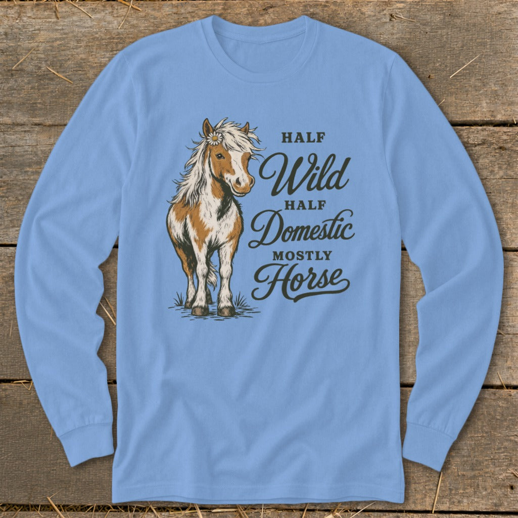 Light blue long-sleeve shirt with a drawing of a horse and text: "Half Wild, Half Domestic, Mostly Horse."