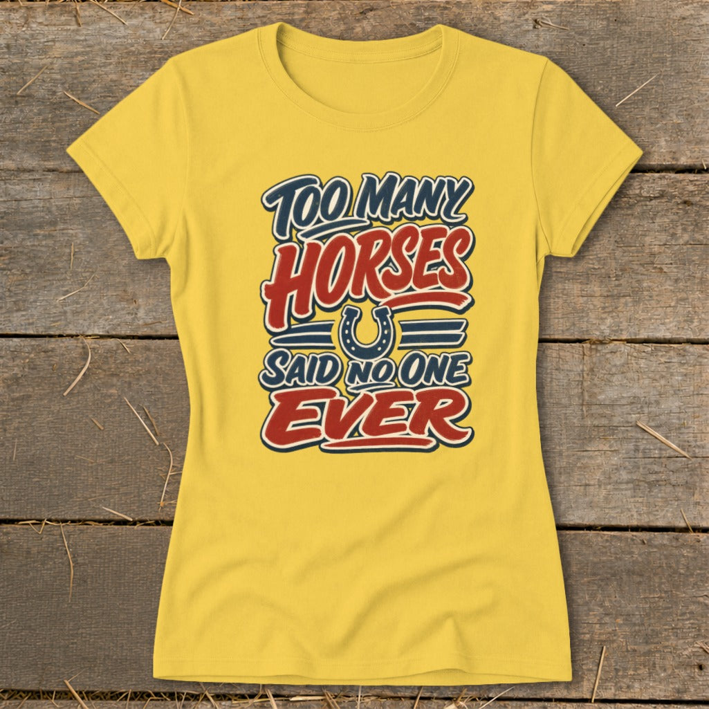 Yellow t-shirt with "Too Many Horses Said No One Ever" text and horseshoe graphic.