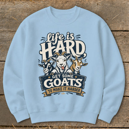Light blue sweatshirt with "Life is HARD, Get Some Goats To Make It Harder" text and three goats.