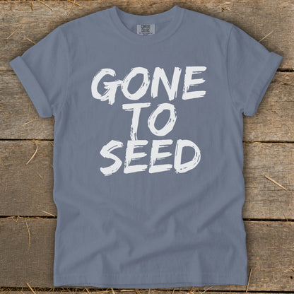Slate gray t-shirt with white text that reads "GONE TO SEED".