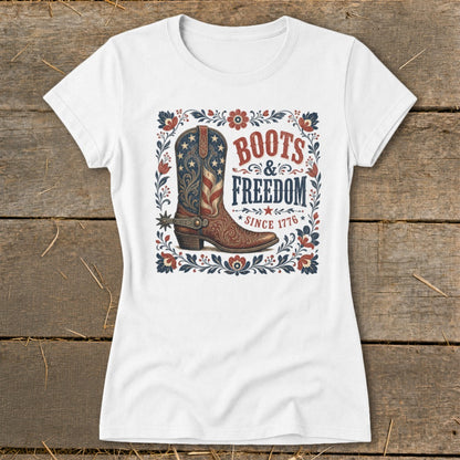 White t-shirt with cowboy boot graphic and text "Boots & Freedom Since 1776".