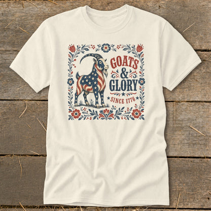 Cream t-shirt with American flag goat graphic and text "GOATS & GLORY SINCE 1776".