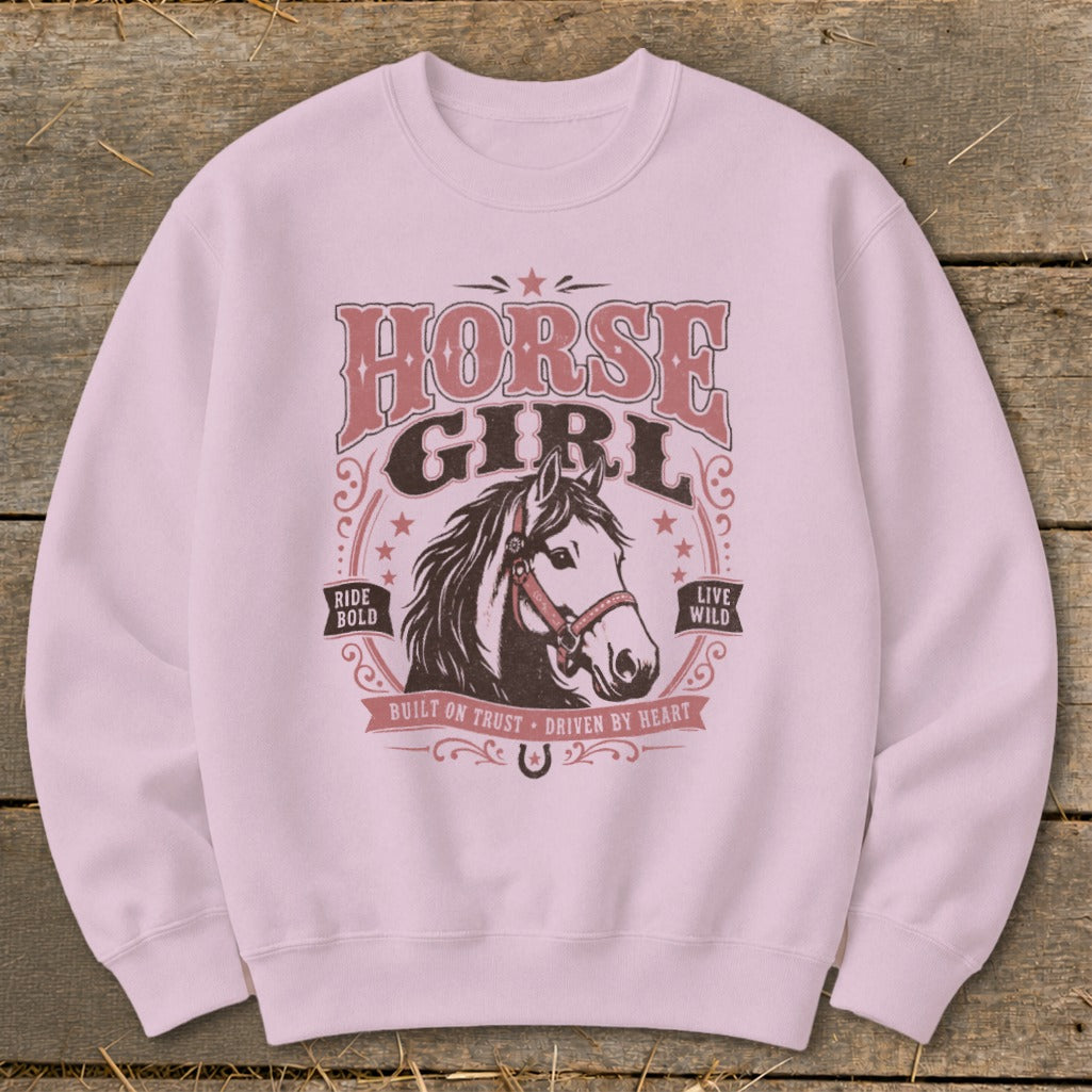 Pink sweatshirt with "Horse Girl" text and horse head graphic.