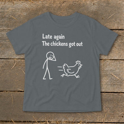 T-shirt with text "Late again. The chickens got out" and cartoon drawings.