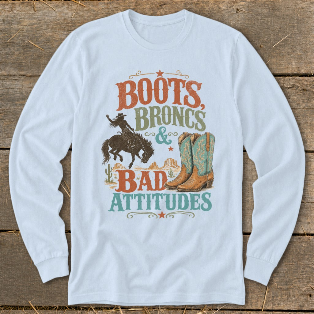 Long sleeve t-shirt with "Boots, Broncs & Bad Attitudes" text and graphic.
