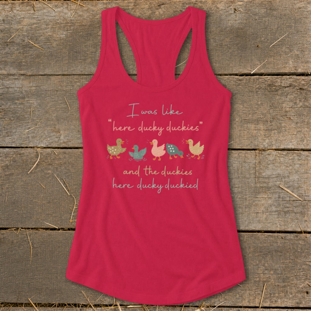 Pink tank top with cartoon ducks and text "I was like 'here ducky duckies' and the duckies here ducky duckied".