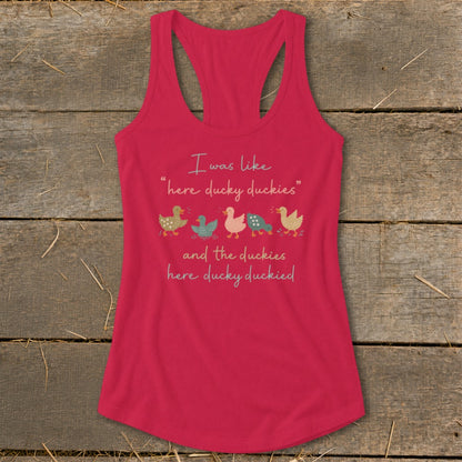 Pink tank top with cartoon ducks and text "I was like 'here ducky duckies' and the duckies here ducky duckied".