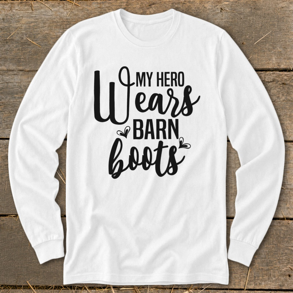 White long sleeve shirt with black text that reads "My Hero Wears Barn Boots".