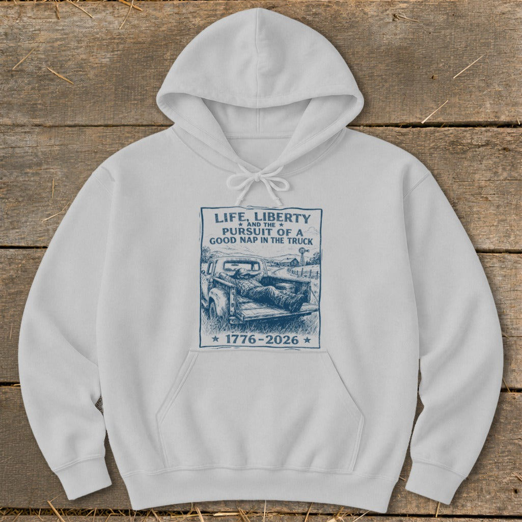 White hoodie with print: "Life, Liberty and the Pursuit of a Good Nap in the Truck 1776-2026".
