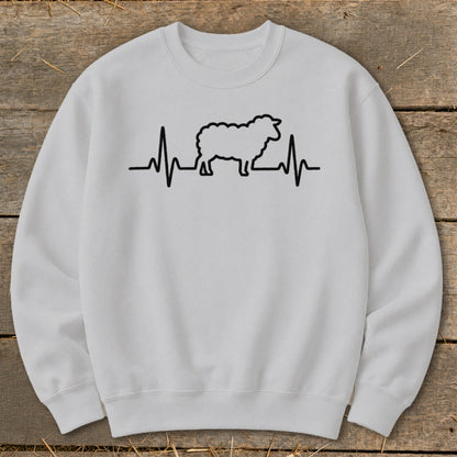 Light gray crewneck sweatshirt featuring a black graphic of a sheep integrated into a heartbeat line.