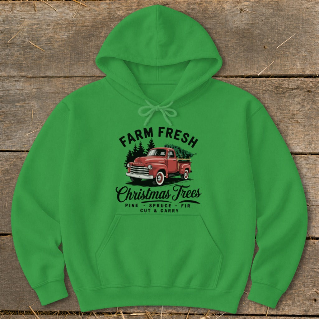 Green hoodie with "Farm Fresh Christmas Trees" graphic featuring a red truck.