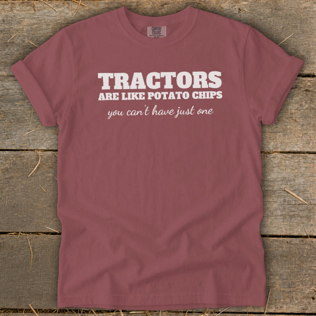 Maroon t-shirt with white text "TRACTORS ARE LIKE POTATO CHIPS you can't have just one".
