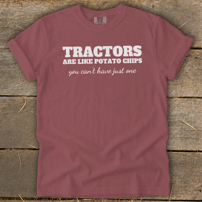 Maroon t-shirt with white text "TRACTORS ARE LIKE POTATO CHIPS you can't have just one".
