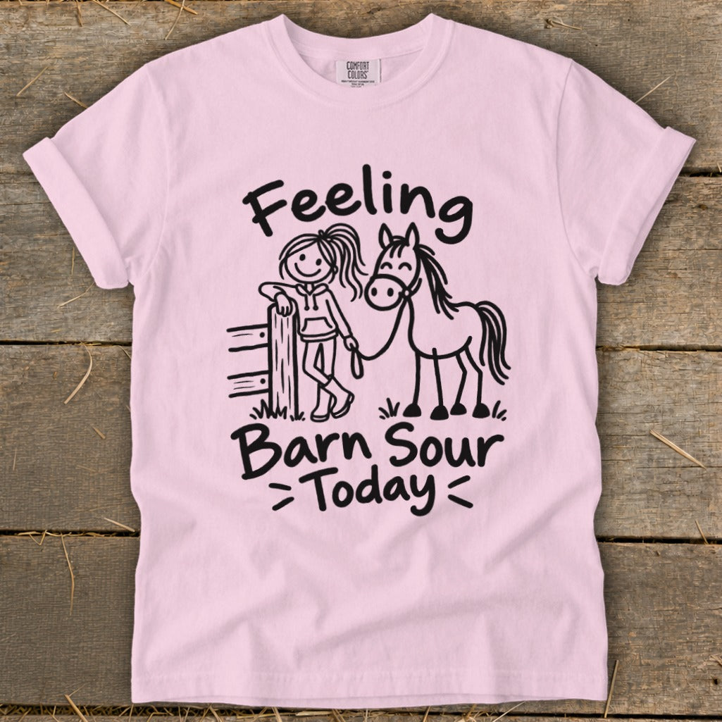 Pink t-shirt with black graphic of girl and horse and text "Feeling Barn Sour Today".