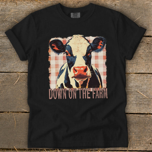 Black t-shirt with a cow graphic and "DOWN ON THE FARM" text.