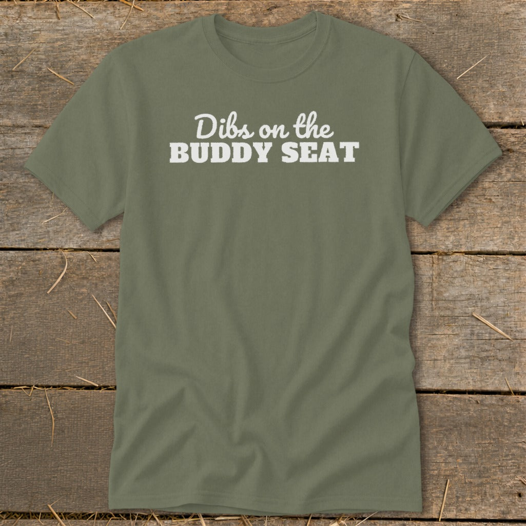 Green t-shirt with white text that reads "Dibs on the Buddy Seat".