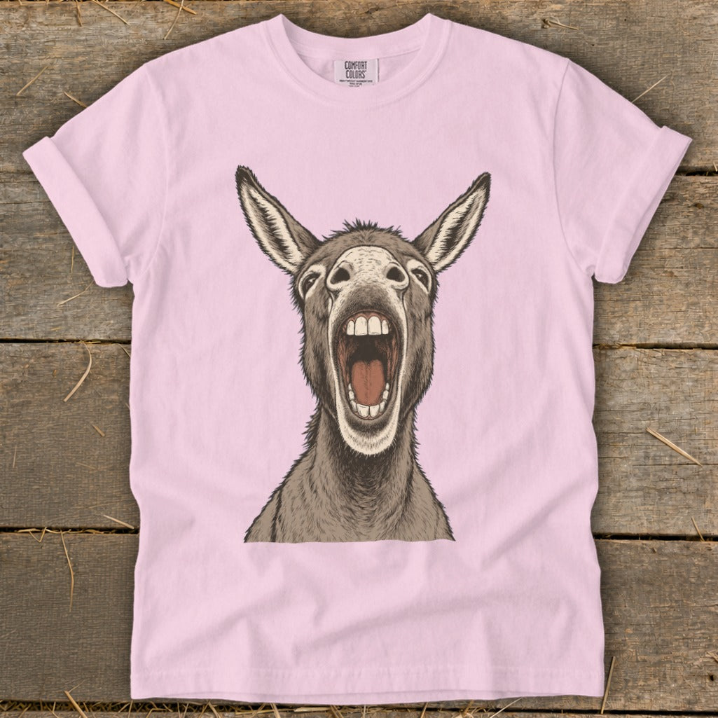 Pink t-shirt with a drawing of a donkey with its mouth wide open.