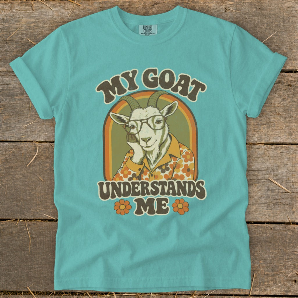 Graphic tee with a goat wearing glasses and a floral shirt, reads "My Goat Understands Me".