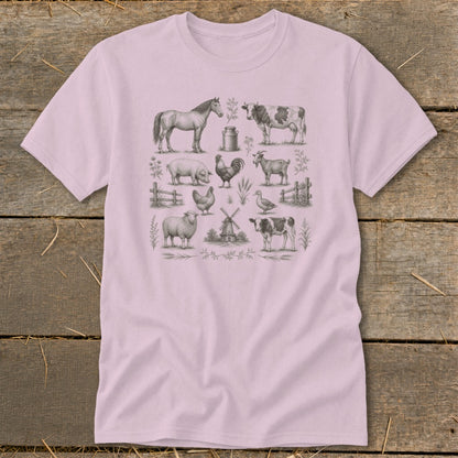 Pink t-shirt with a vintage farm animal illustration including a horse, cow, pig, and chicken.