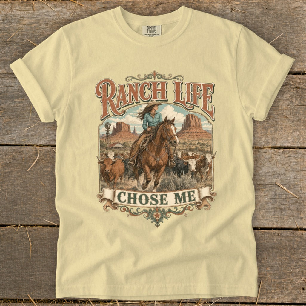Shirt with graphic of cowgirl on horse with cattle and "Ranch Life Chose Me."