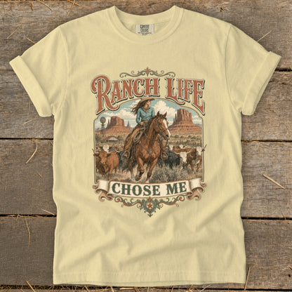Shirt with graphic of cowgirl on horse with cattle and "Ranch Life Chose Me."