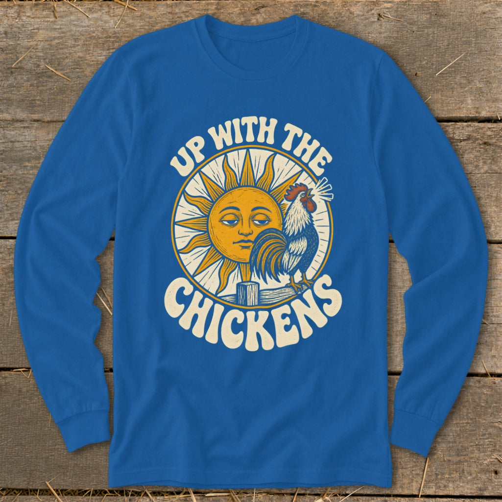 Royal blue long-sleeve shirt featuring a graphic of a sun and rooster with the text UP WITH THE CHICKENS.