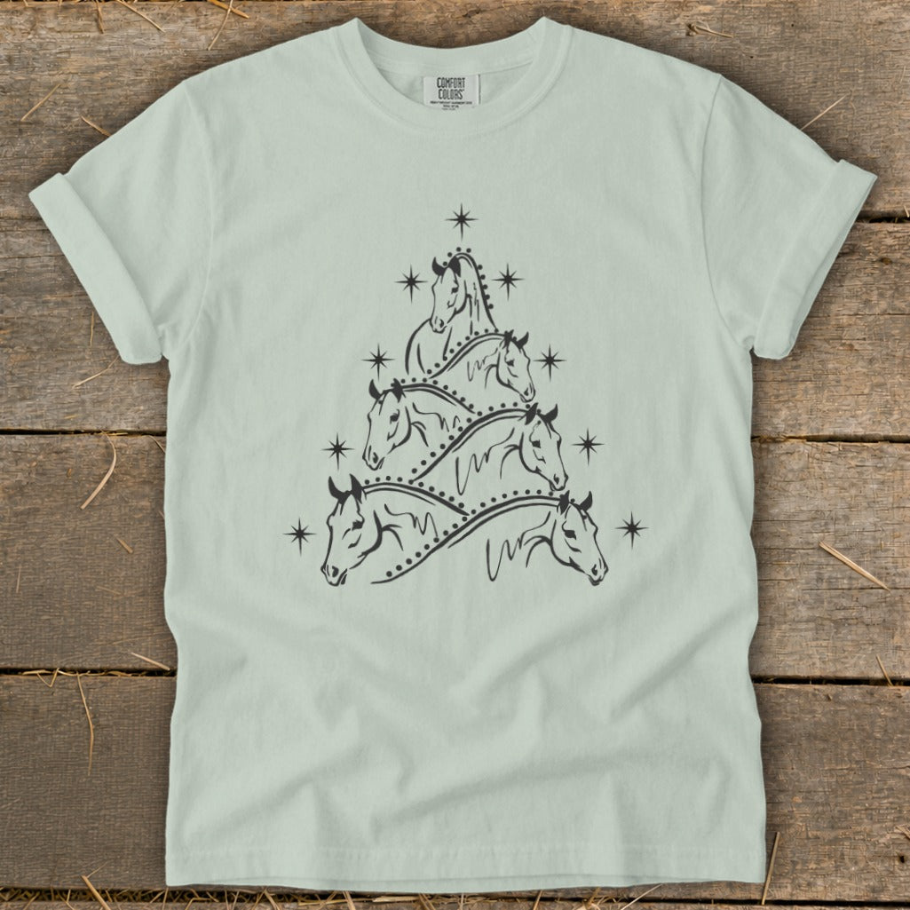 T-shirt with black line art of horses forming a Christmas tree shape.