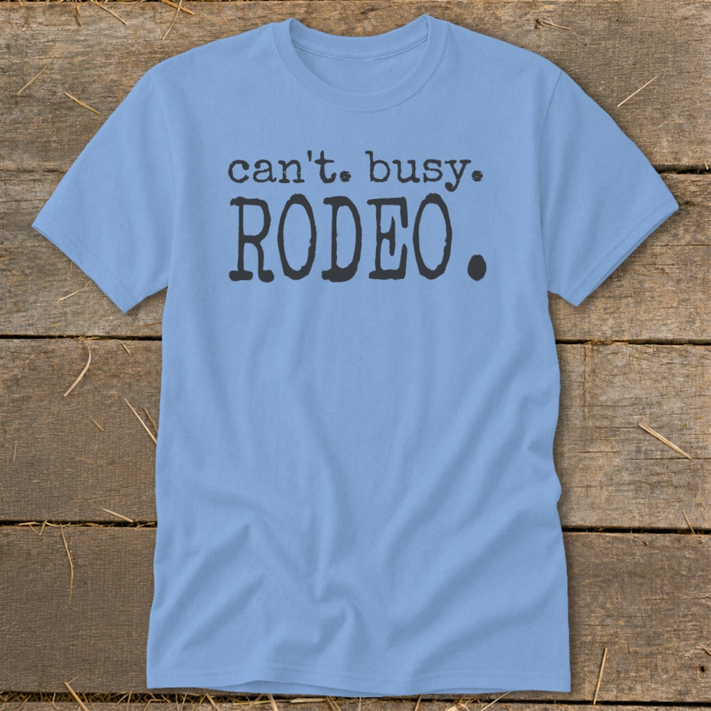 Light blue t-shirt with black text that says "can't. busy. RODEO."
